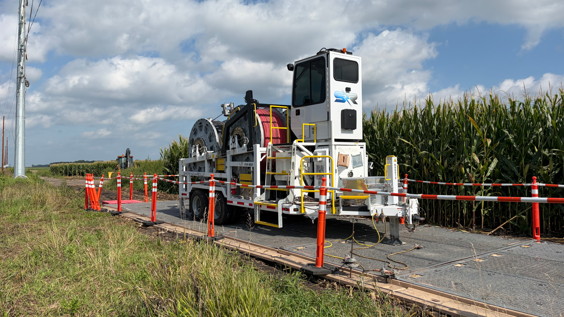 Sherman+Reilly Inc. trailer with cables roadside
